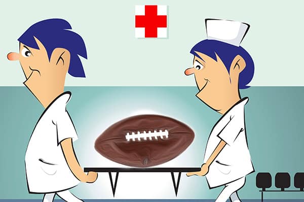 Football is dying cartoon  picture of football being carried on a stretcher.