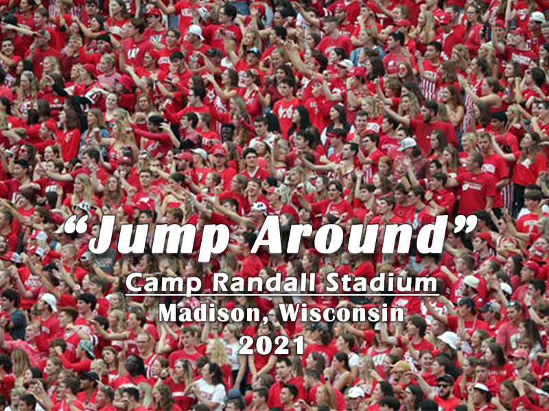 Raucous fans pack stadium at Wisconsin vs Penn State football game, singing to "Jump Around" by House of Pain. 