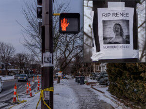A street corner stoplight at East 34th Street and Portland Avenue in Minneapolis, Minnesota, is covered in posters of Renee Good with text reading "Murdered by ICE," showing an inset close-up of the protest poster. January 20, 2026 (Photo by Awe Video & Photo Studio) A street corner stoplight at East 34th Street and Portland Avenue in Minneapolis, Minnesota, is covered in posters of Renee Good with text reading "Murdered by ICE," showing an inset close-up of the protest poster. January 20, 2026 (Photo by Awe Video & Photo Studio)